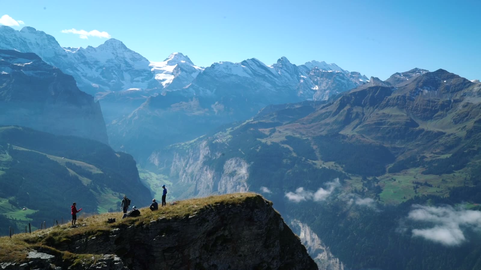 Mountaineers crossing a high ridge